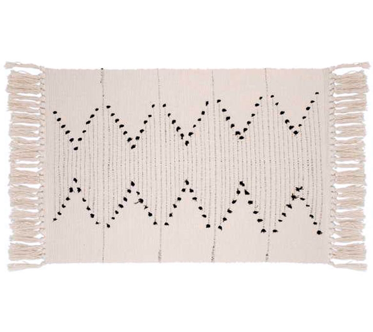 Tapis crème et noir de chez Zone Maison